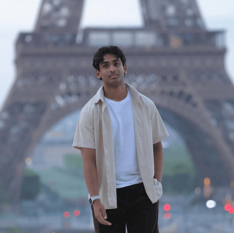 Ritviik Ravi in front of the Eiffel Tower